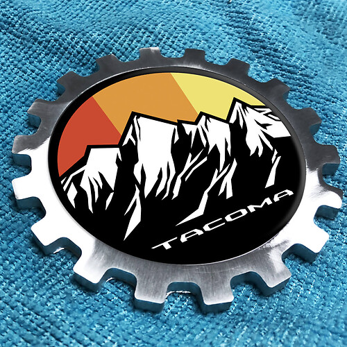 Toyota Tacoma ପର୍ବତ Vintage ଲୋଗୋ ମେଟାଲ୍ ଆଲୁମିନିୟମ୍ ବେଜ୍ ସାଇଡ୍ ଗିୟାର୍ ଏମ୍ବଲେମ୍ ଆଲୁମିନିୟମ୍ 
