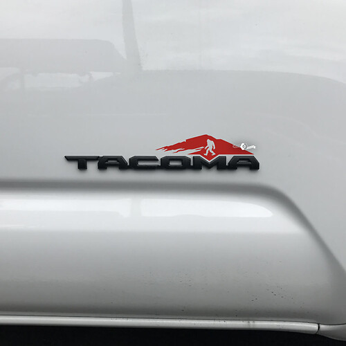 Toyota Tacoma Mountains Bigfoot Sasquatch Yeti Decal Sticker Over Badge Tacoma